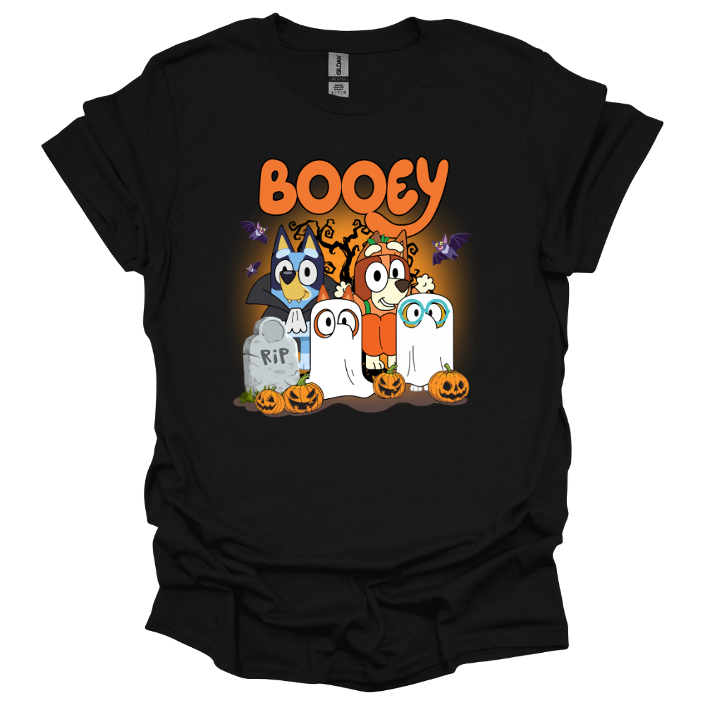 Black youth t-shirt featuring Bluey-inspired characters in Halloween costumes with the word "Booey," tombstones, pumpkins, bats, and spooky trees.