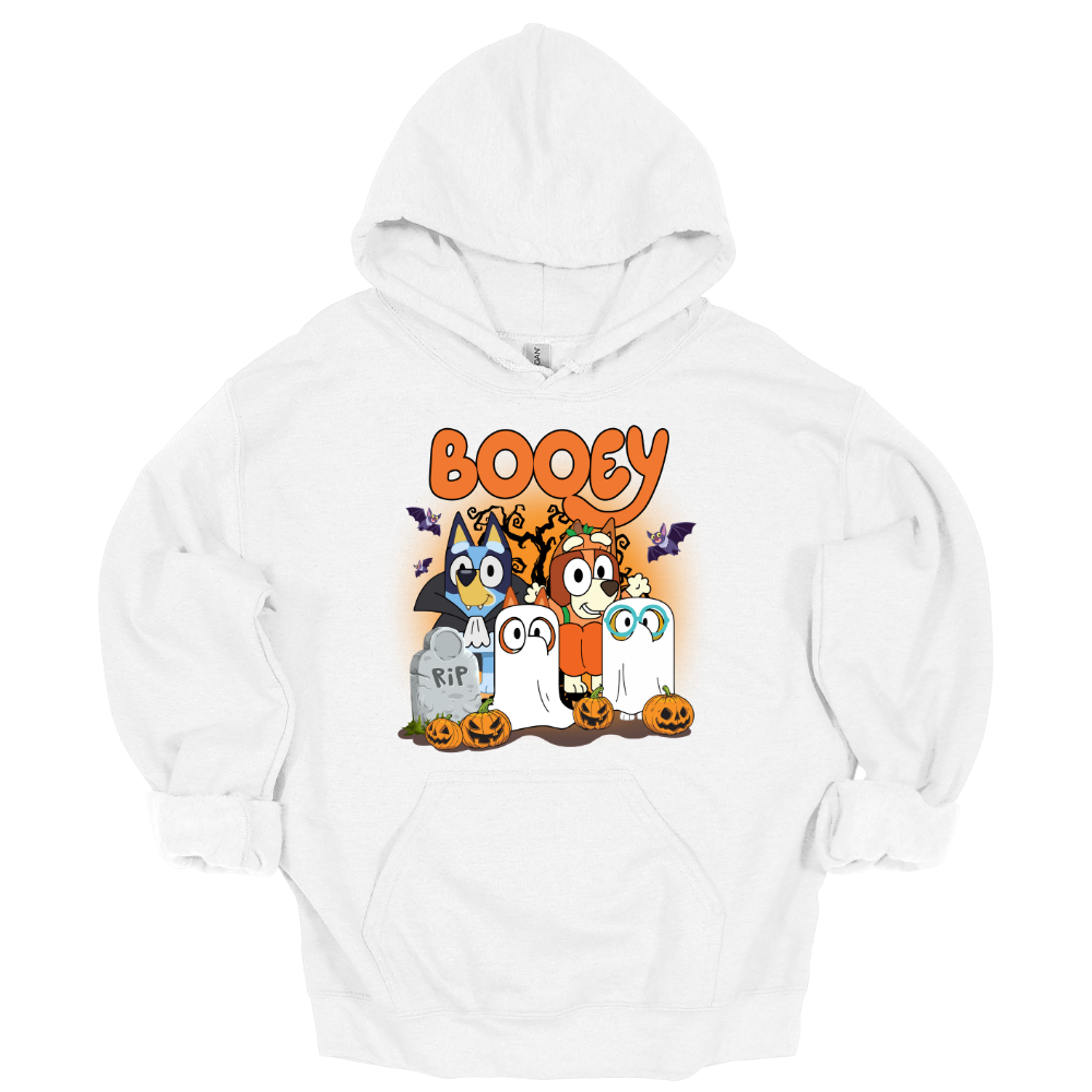 White youth hoodie featuring Bluey-inspired characters in Halloween costumes with the word "Booey," tombstones, pumpkins, bats, and spooky trees.
