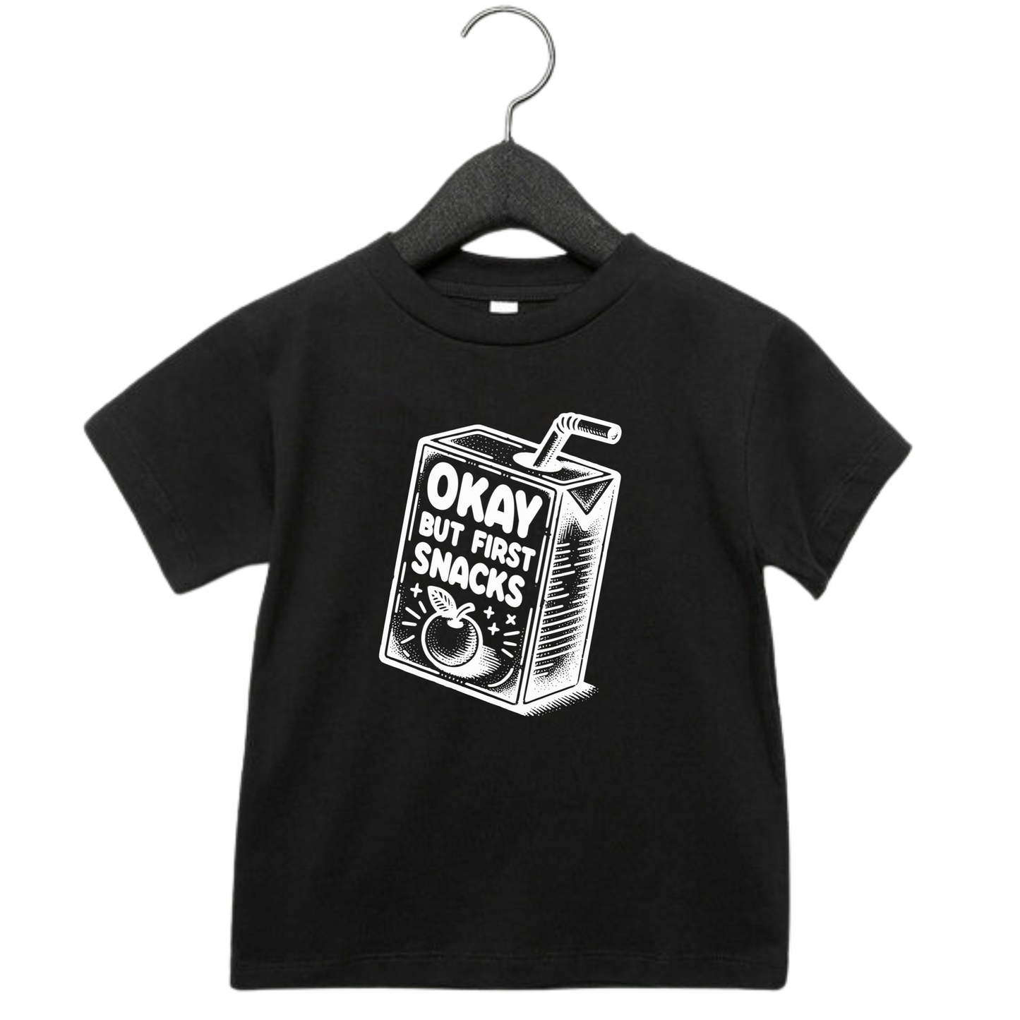 Toddler graphic tee with snack carton and the phrase ‘Okay But First Snacks’ – funny shirt for kids
