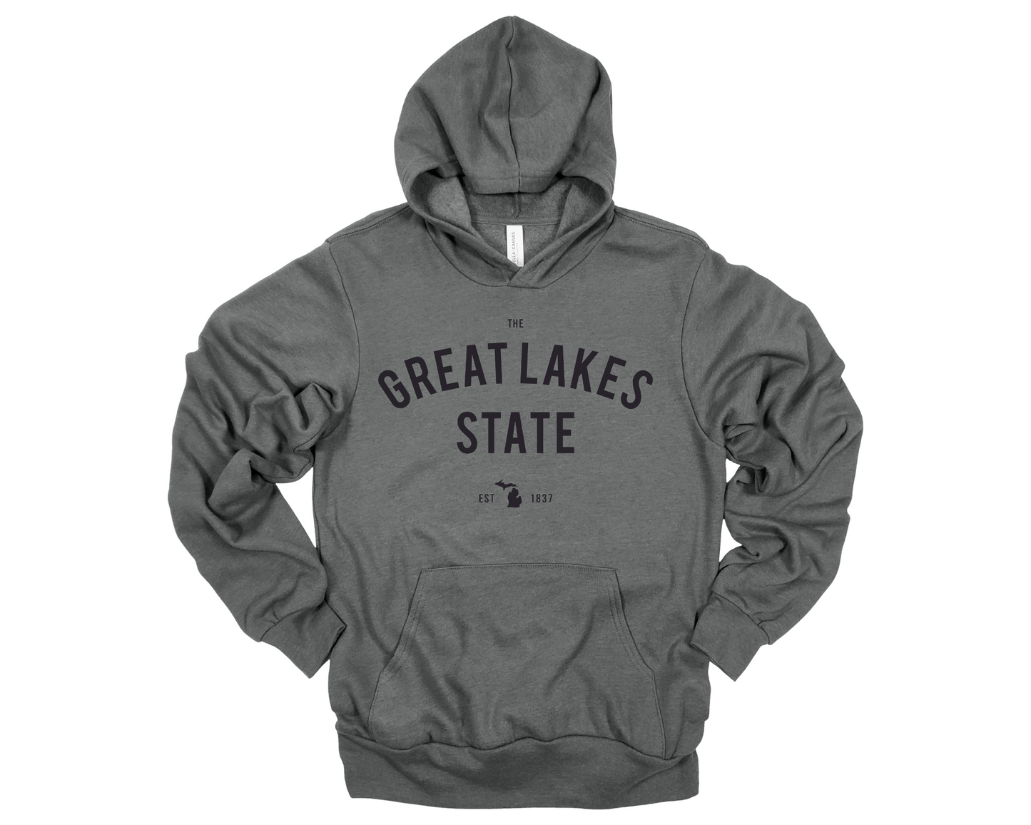 Cozy deep heather gray hoodie with Michigan pride design displayed in a modern, neutral-toned setting.