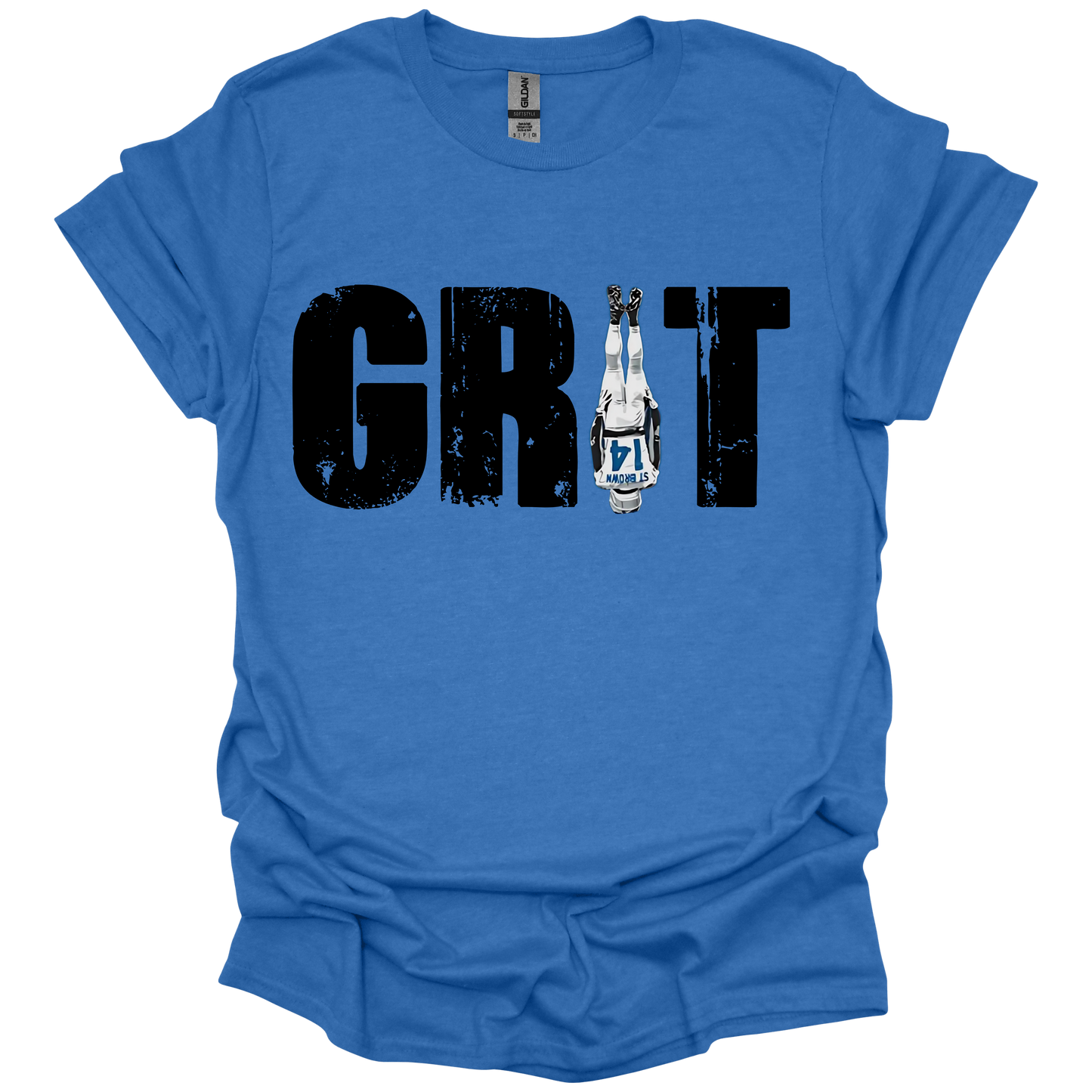 A blue T-shirt featuring the word 'GRIT' in bold, distressed blue capital letters. The letter 'I' is creatively replaced with the iconic headstand pose from Amon-Ra St. Brown wearing a white Detroit uniform, emphasizing toughness and resilience. The design has a gritty, determined feel, perfect for Detroit football fans.