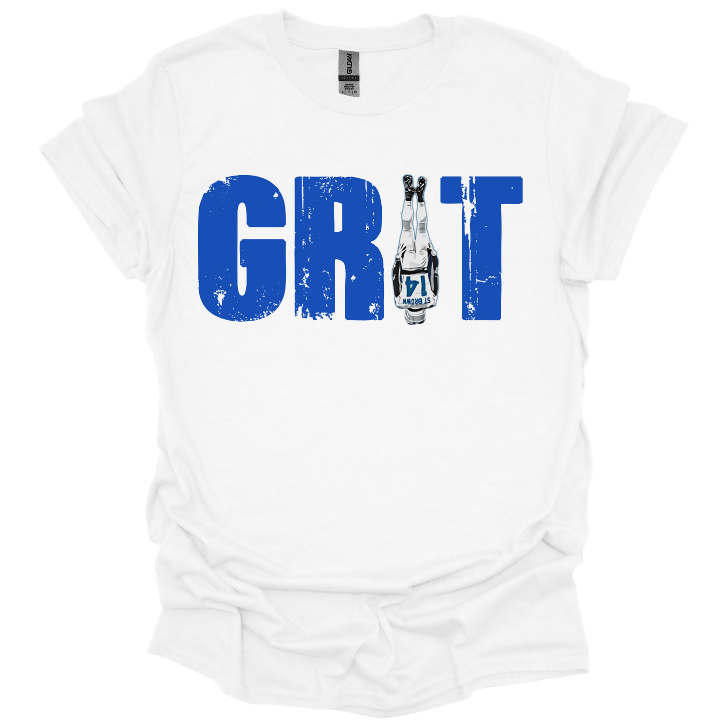 A white T-shirt featuring the word 'GRIT' in bold, distressed blue capital letters. The letter 'I' is creatively replaced with the iconic headstand pose from Amon-Ra St. Brown wearing a white Detroit uniform, emphasizing toughness and resilience. The design has a gritty, determined feel, perfect for Detroit football fans.