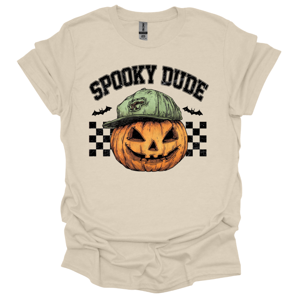 Natural color Youth Halloween shirt with “Spooky Dude” design featuring a pumpkin with a backwards cap and checkerboard background