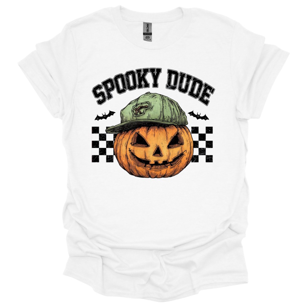 White youth Halloween shirt with “Spooky Dude” design featuring a pumpkin with a backwards cap and checkerboard background
