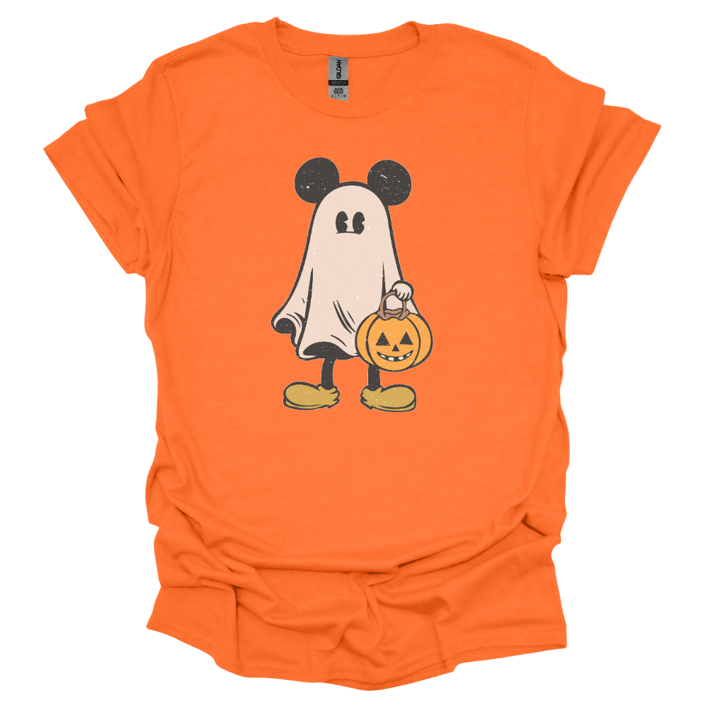 Cartoon ghost with mouse ears holding a jack-o'-lantern bucket, wearing yellow shoes on a bright orange youth T-shirt